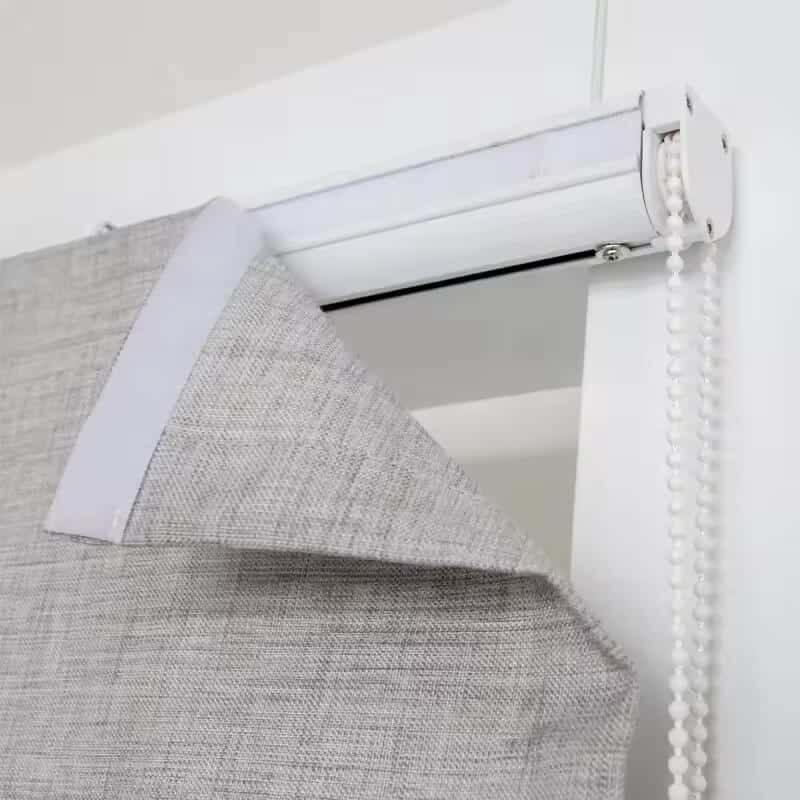 Roman Blind grey with fabric half open showing chain control