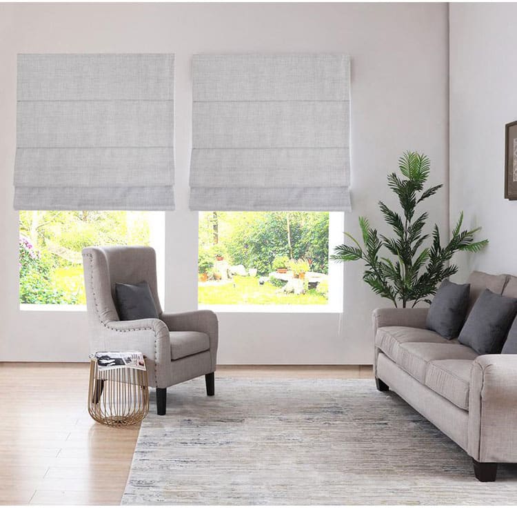 grey roman blinds on living room window
