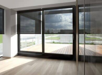 sun filter roller blinds in living room looking out the deck