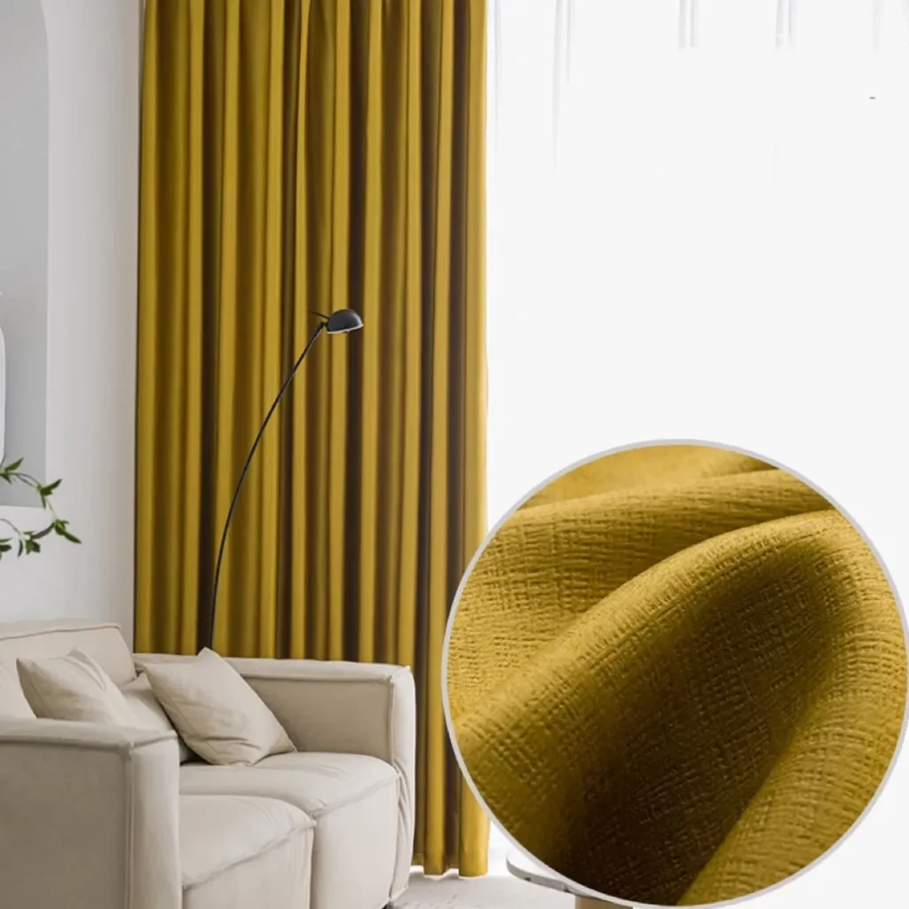 yellow curtain on living room window by the couch 