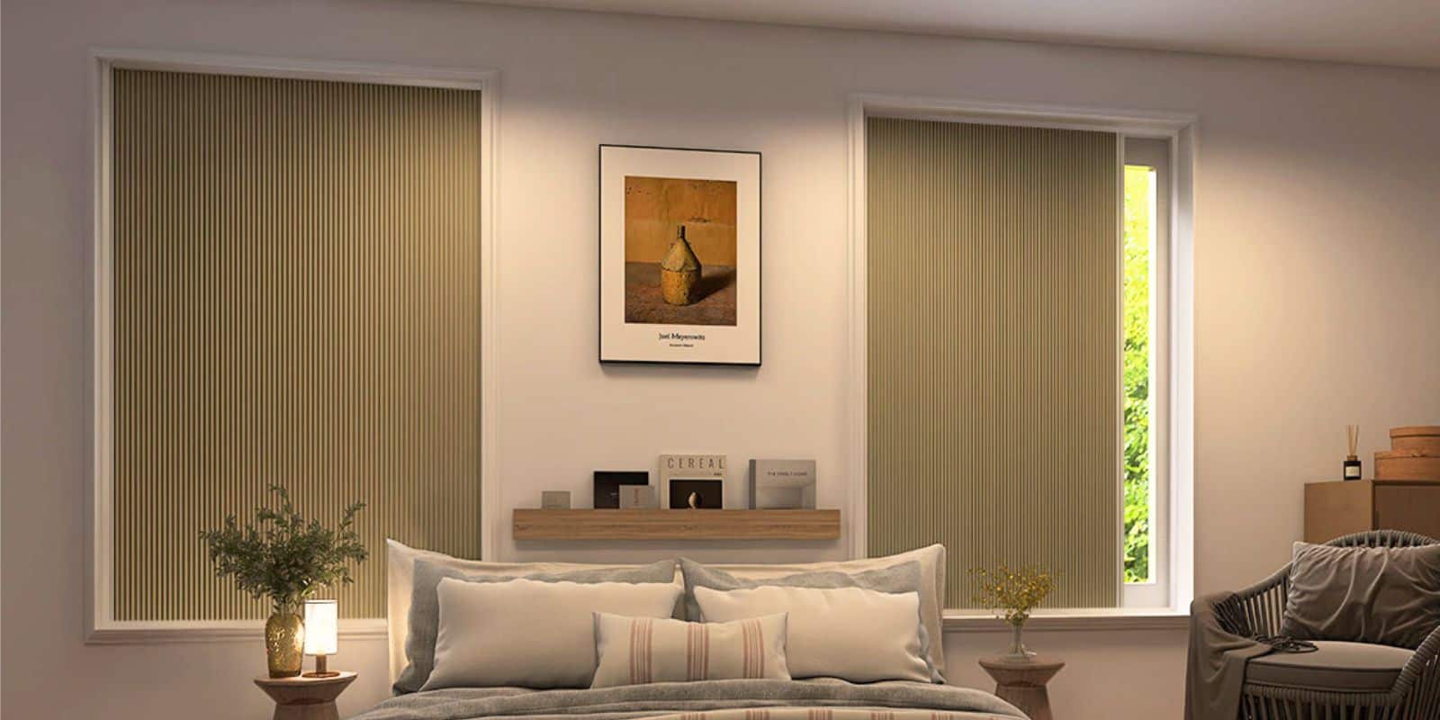 vertical track blinds in bedroom windows above bedside tables