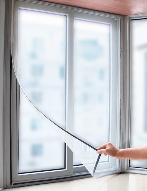magnetic screen on window with hand opening it